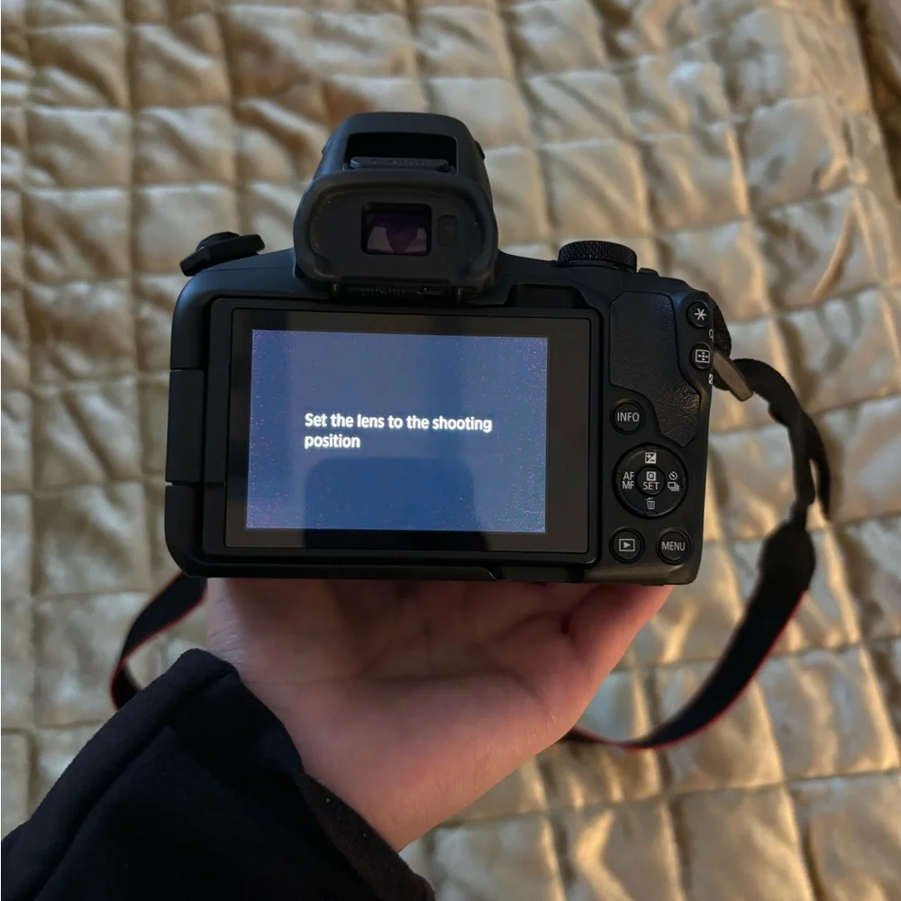 Canon EOS Black Digital Camera with Red Accents